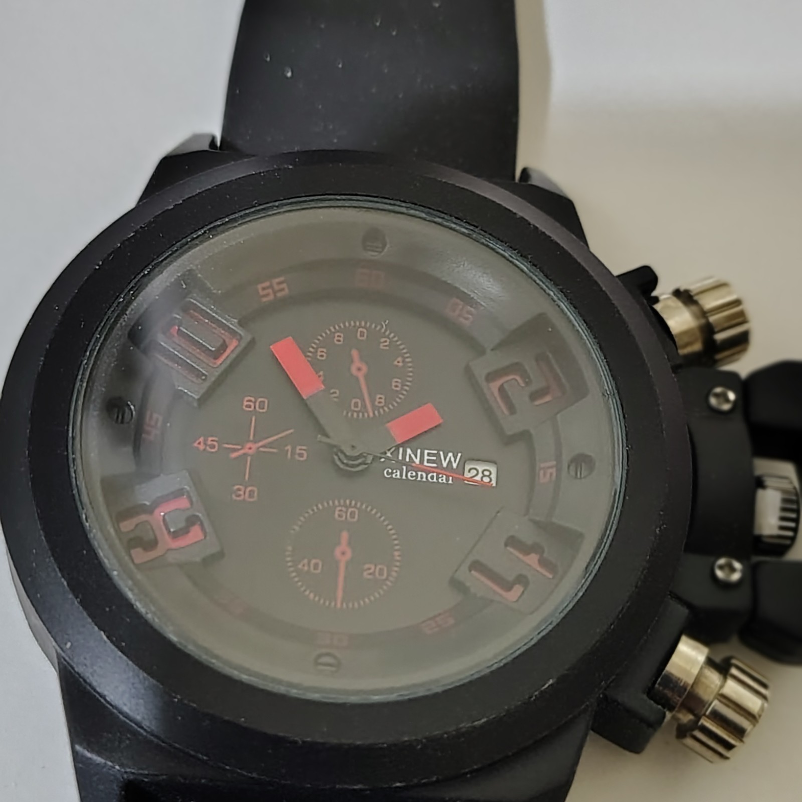 XINEW Mens watch Black Dial Date Quartz Japan Movt unique modern look