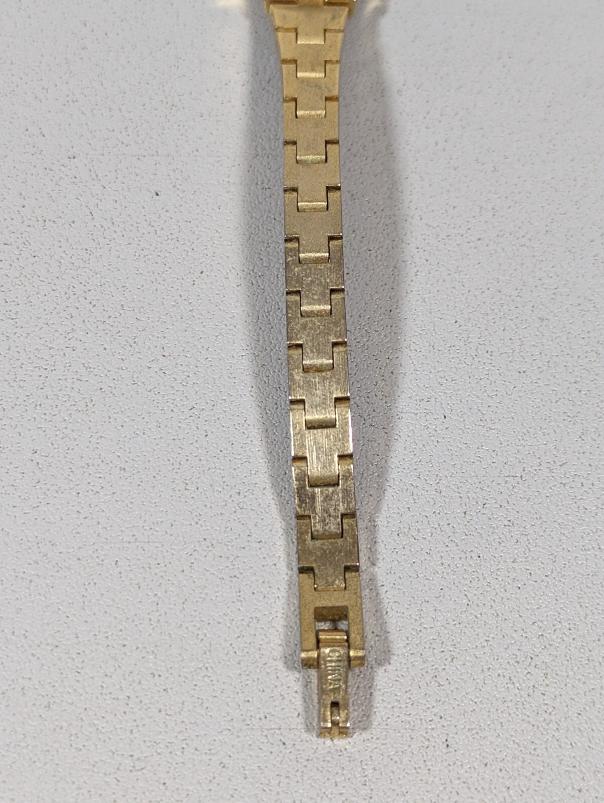 Sharp Womans Silver Dial GoldTone Oval Case Textured Bracelet Band Watch 6.75 in