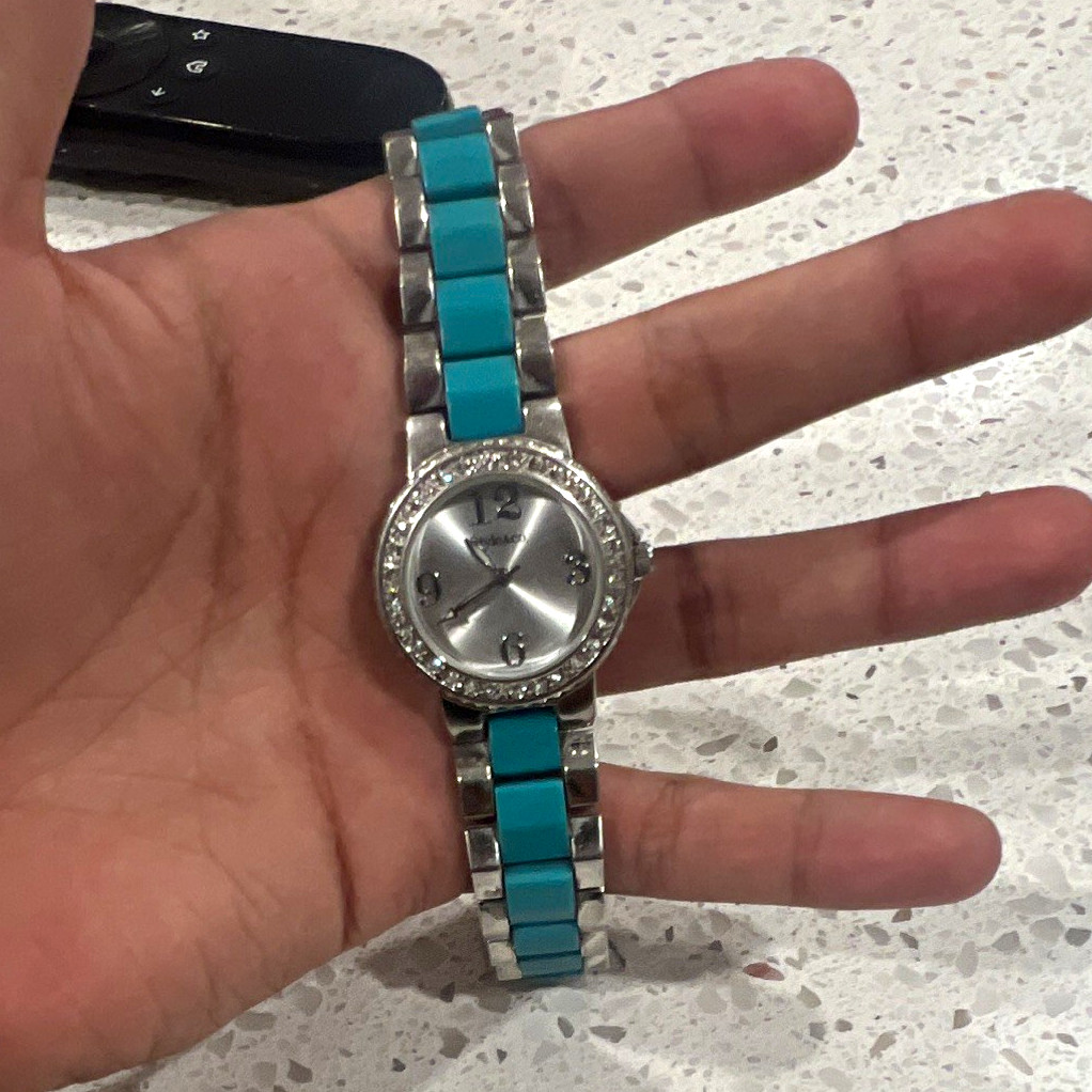 Geneva Women’s Quartz Analog Watch Blue/Silver SS Bracelet Gem-Set Bezel.