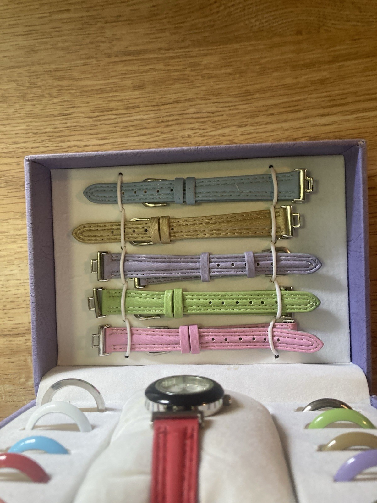 This is a St George watch set with interchangeable bands and bezels