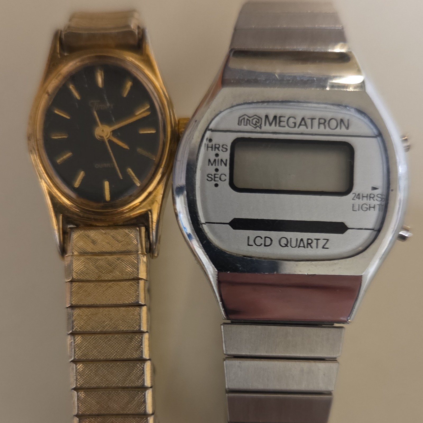 Megatron LCD Quartz Digital LCD Wristwatch Light 24-Hour Dial Metal Bracelet