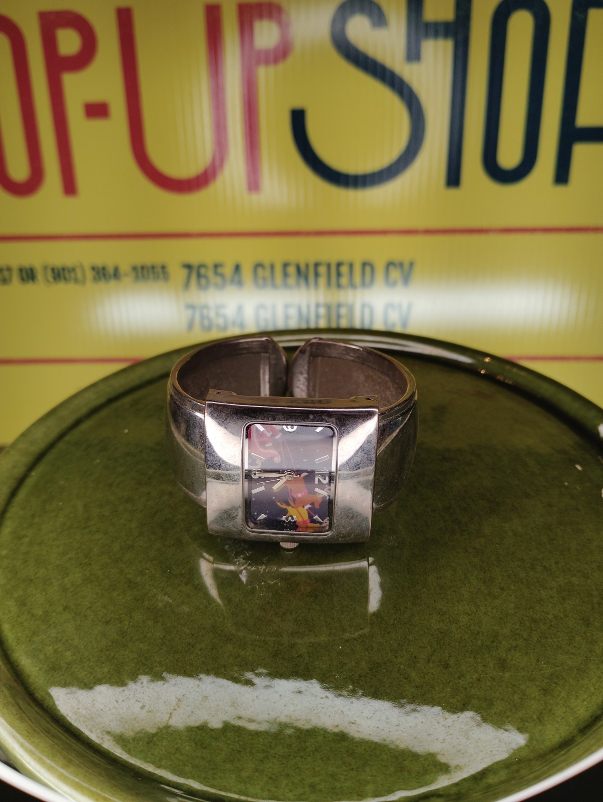 Vintage Silver Tone Cuff Watch with Abstract Dial