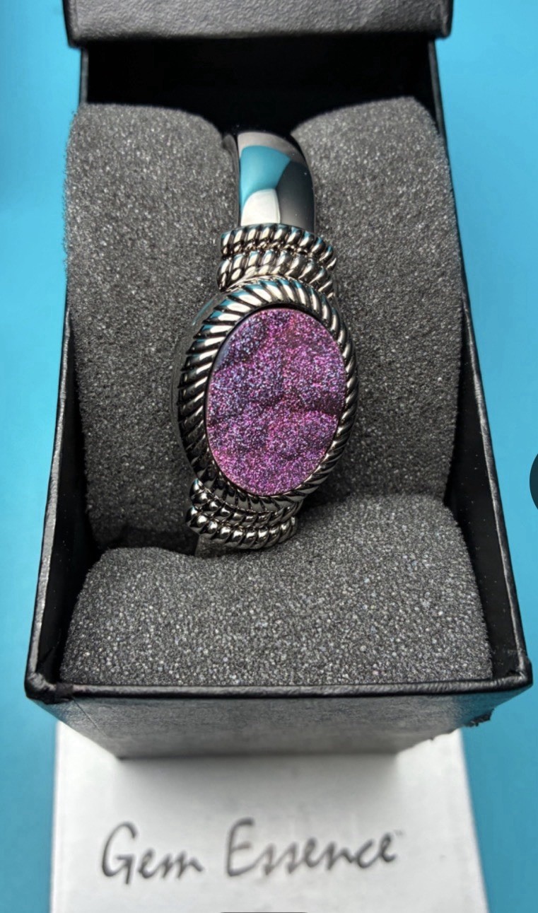 Gem Essence silver-tone watch features a distinct purple druzy stone