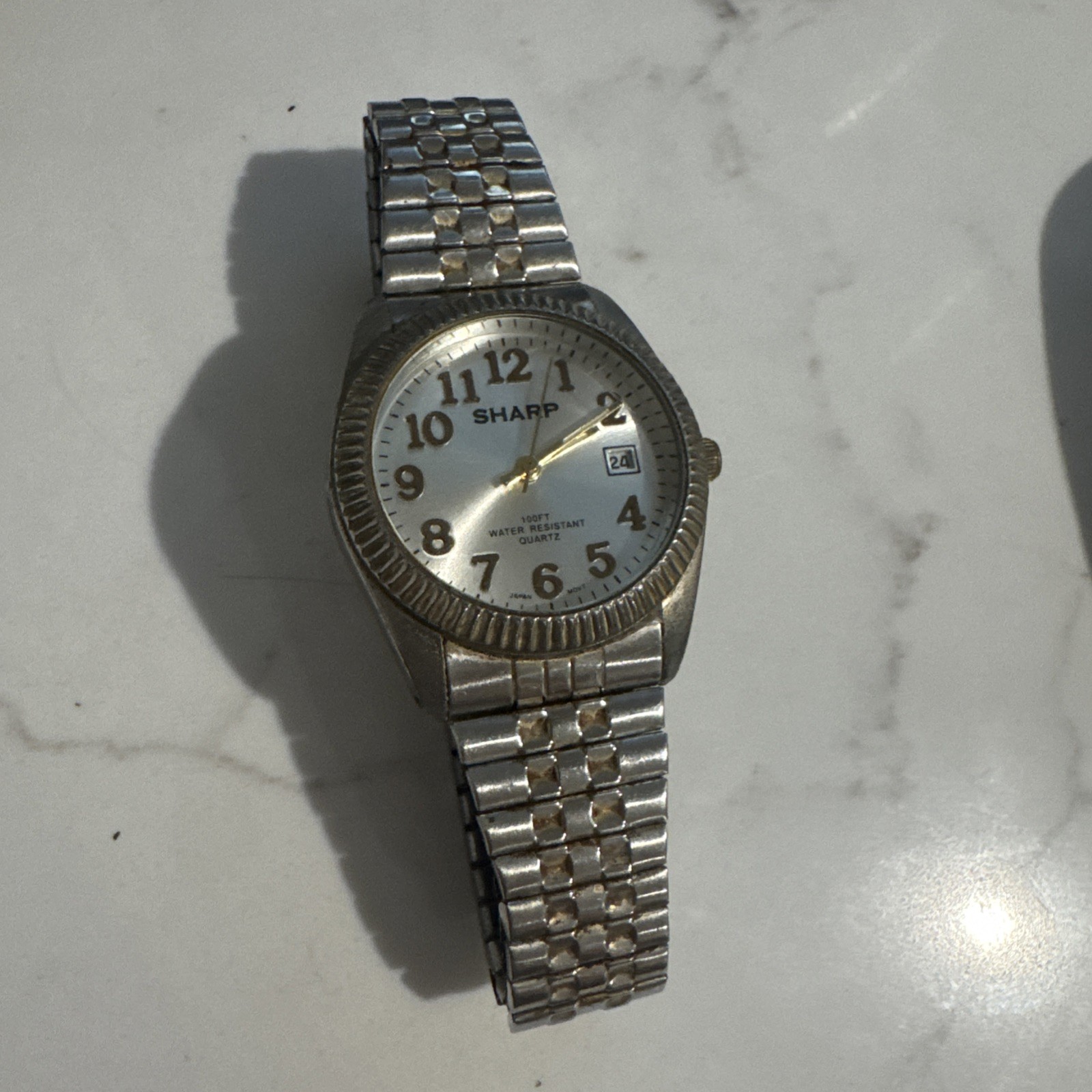 Sharp Mens Watch w/Date Indicator 100 Feet Water Resistant Gold & Silver