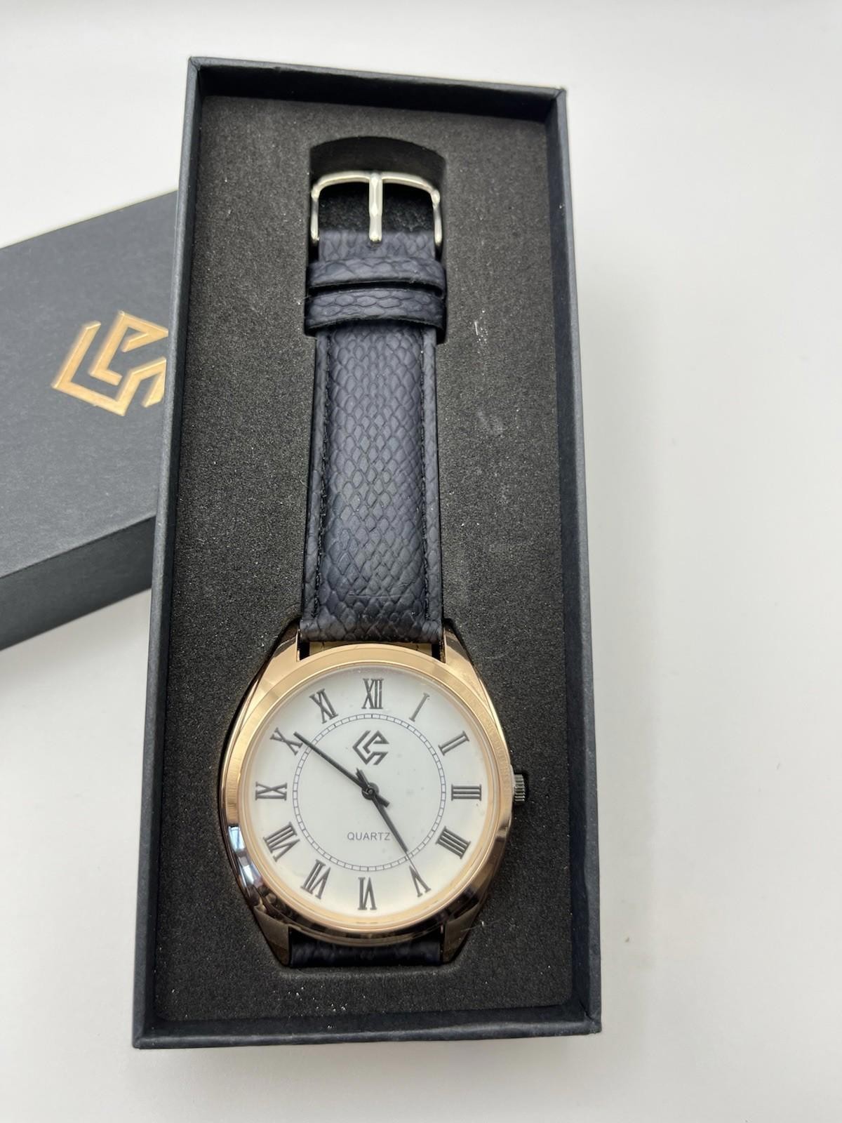 Watch Women’s or Unisex Rose Gold & White Tone Dial Black Band New in box
