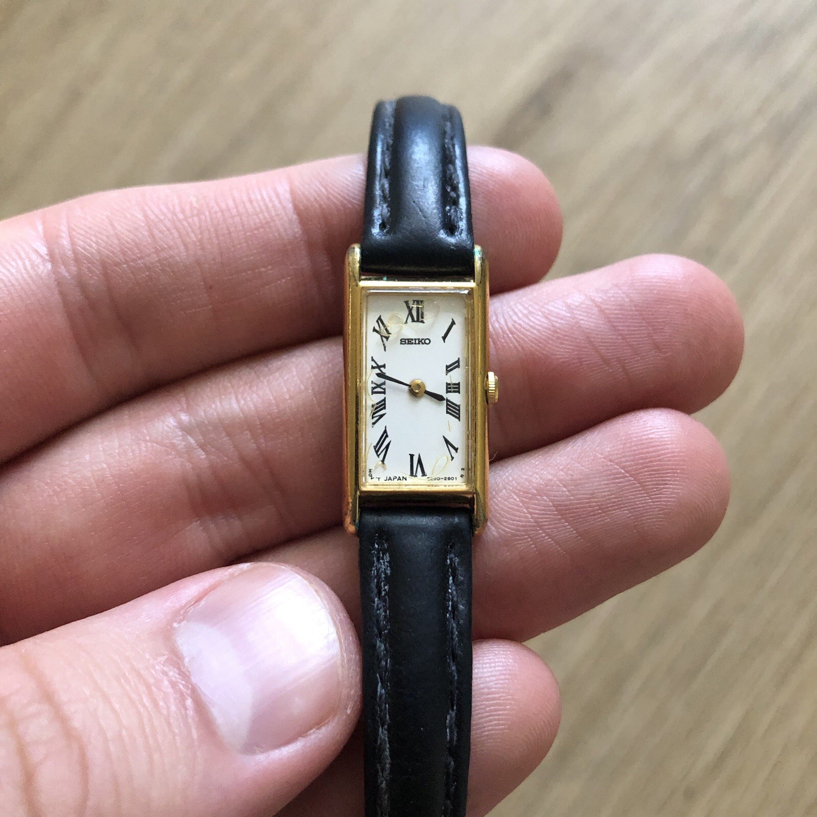 Seiko Tank Ladies Women’s Gold White Black Leather Roman Numeral Watch 2E20-6129