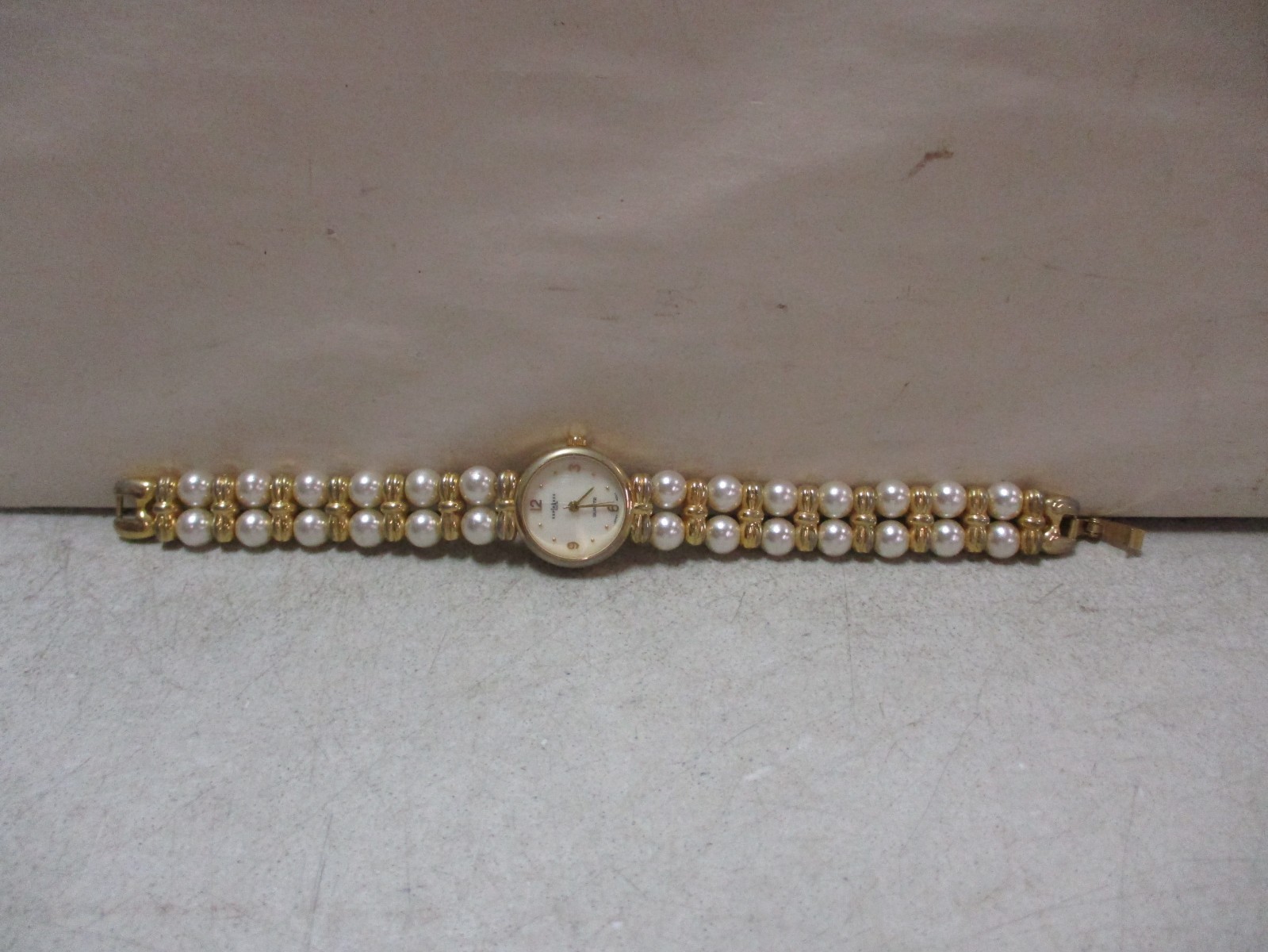 Avon Womens Gold Tone Pearl Bracelet Watch