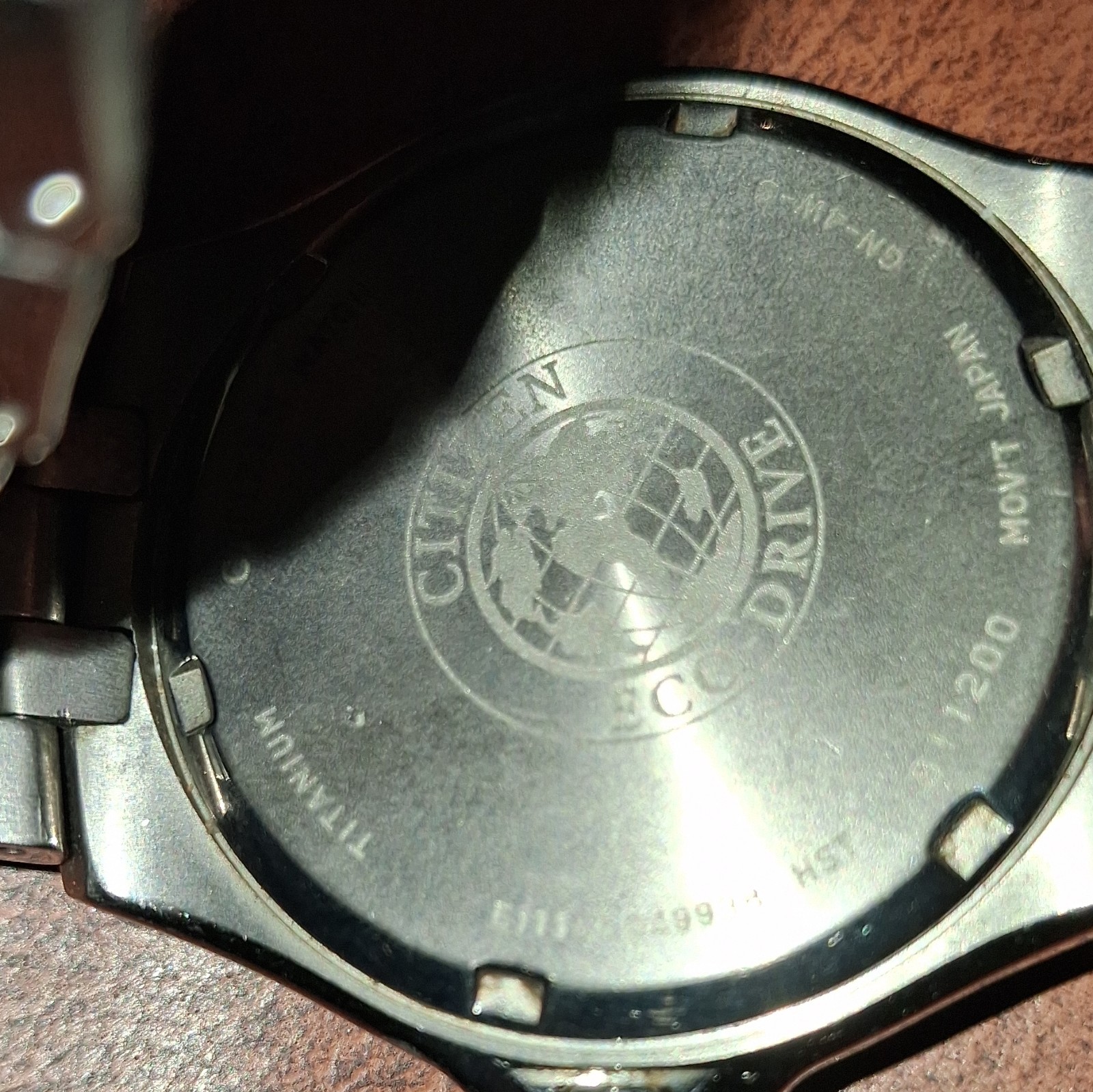 Citizen Eco-Drive Titanium WR100 Silver Dial Date Men’s Watch 40mm