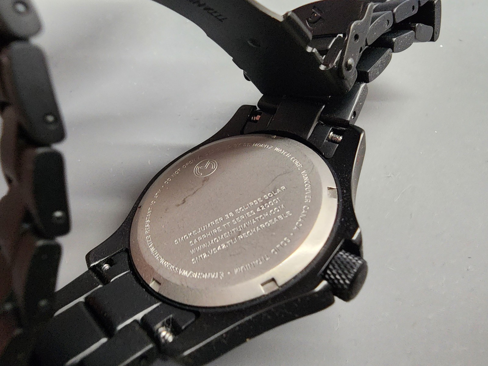 Momentum Smokejumper Eclipse Titanium Solar Quartz Wristwatch 38mm With Box