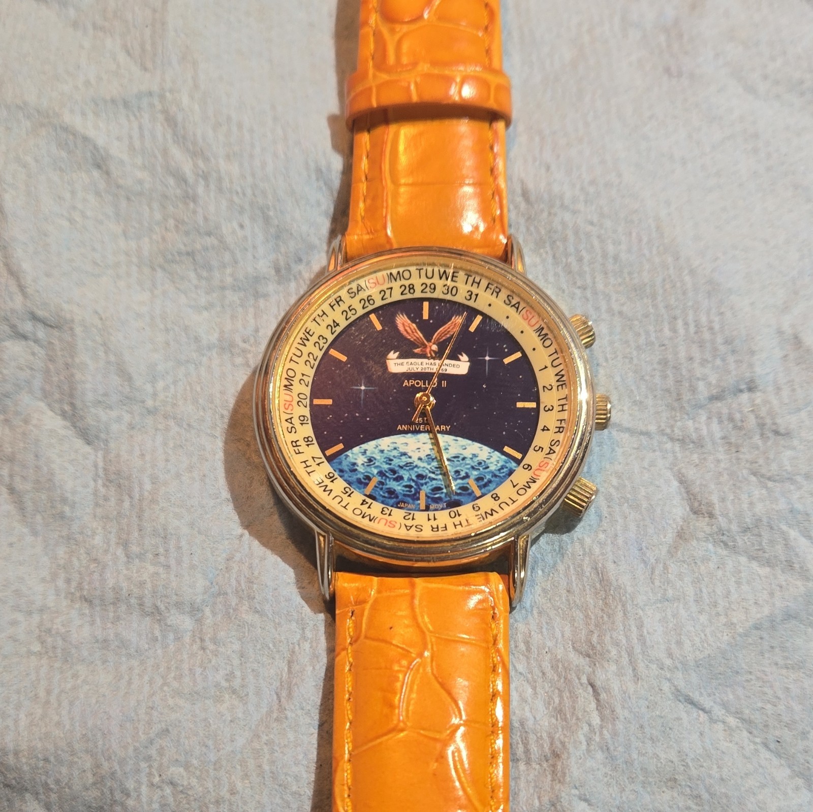 Apollo 11 Space Theme Quartz Analog Day/Date Orange Leather Strap Gold Case