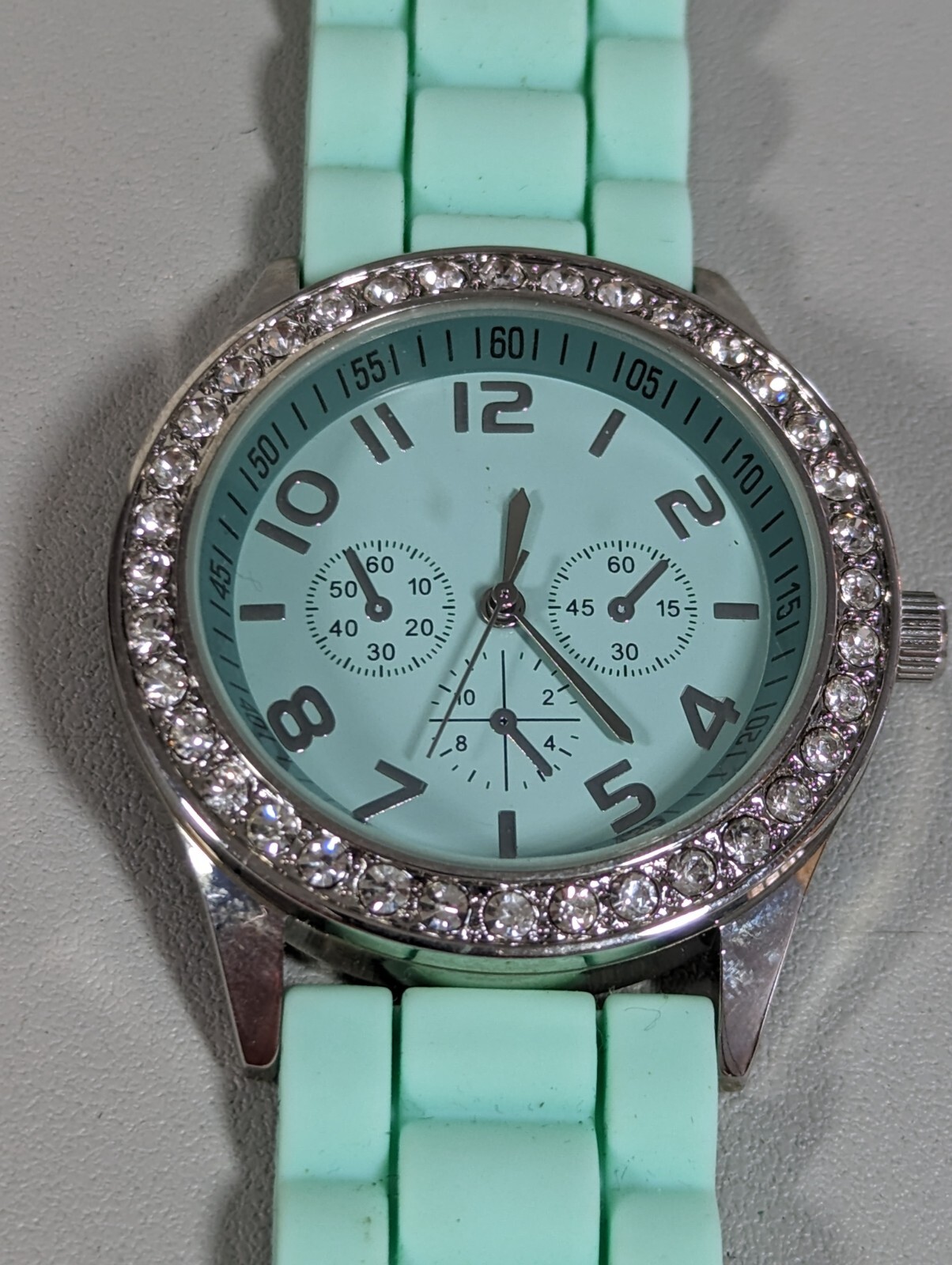 Green Dial Crystal Accent Round Silver Tone Case Green Silicone Band Watch