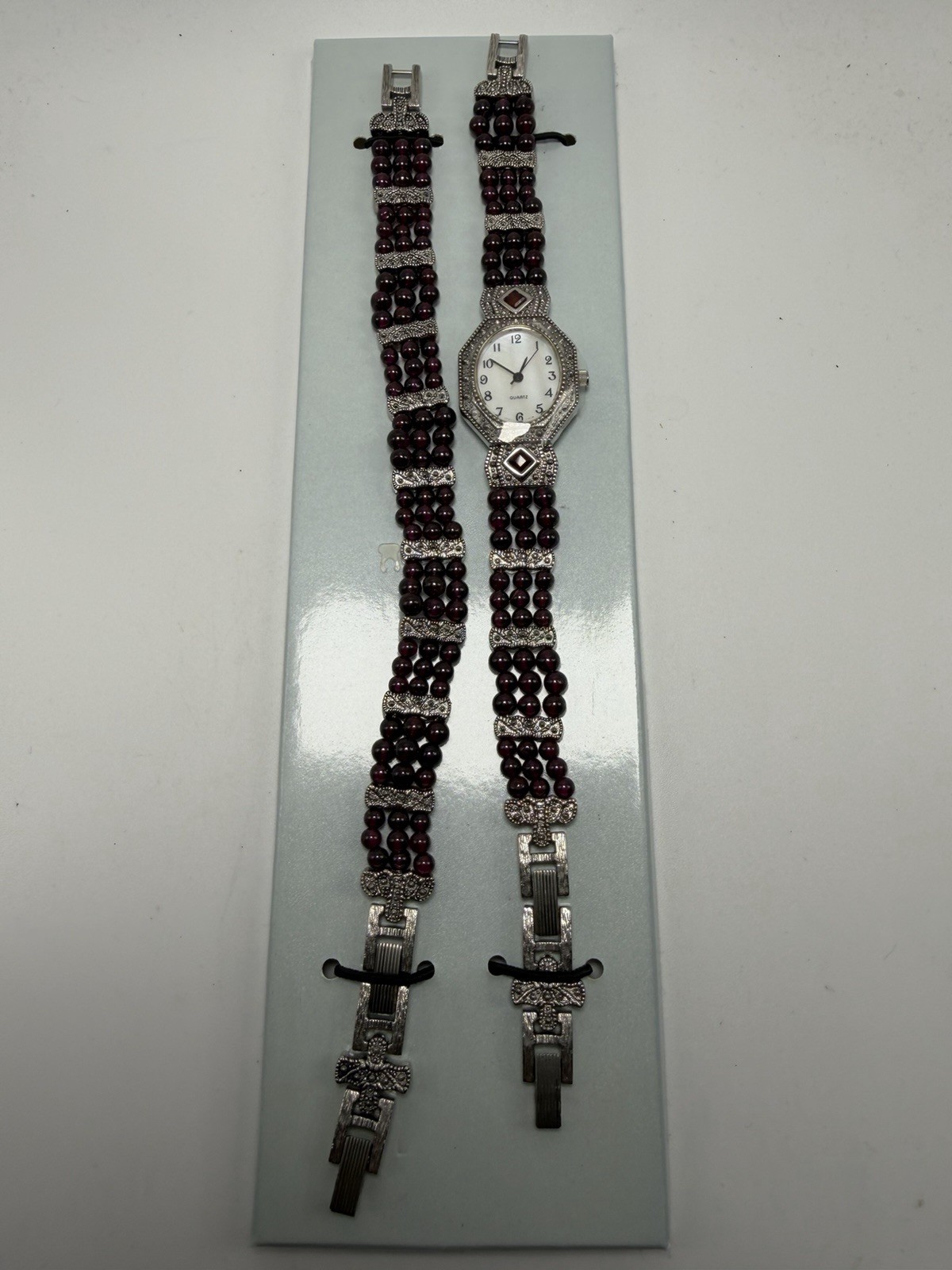 Avon f66678 Marcasite Garnet Beaded New Battery Ladies MOP Watch 23MM 7.5″