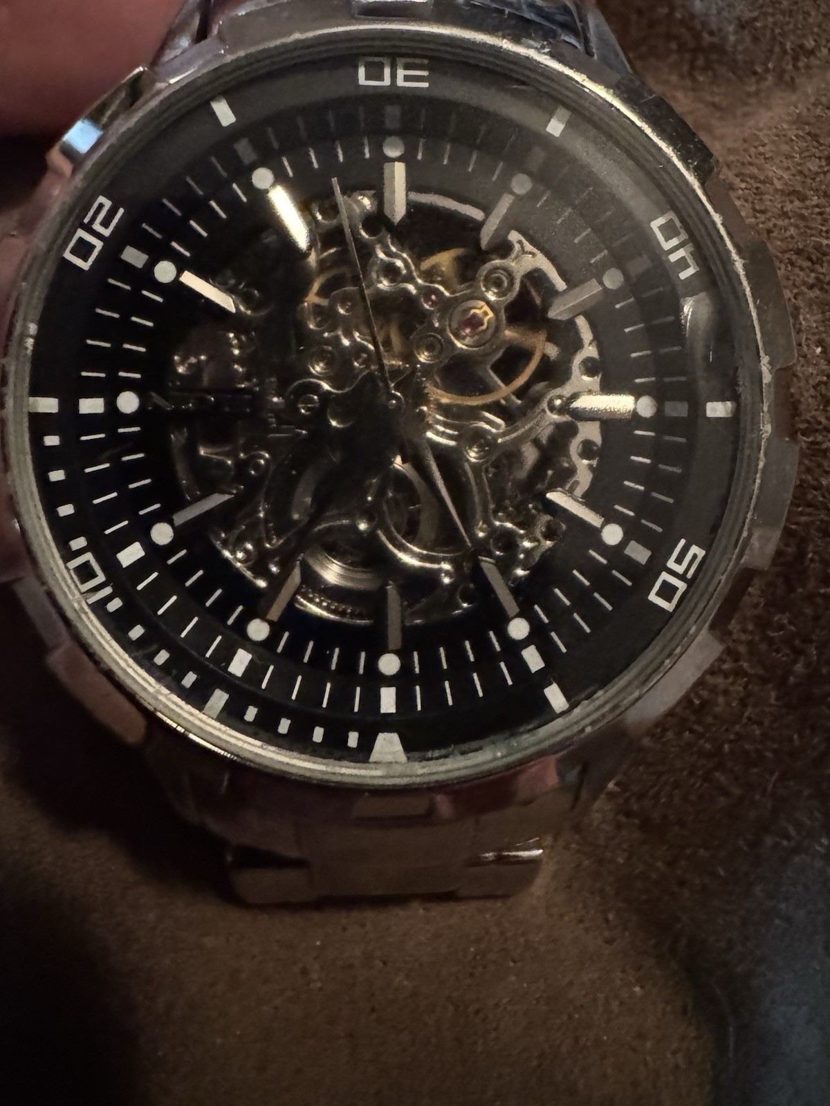 ELGIN”, “BASE METAL BEZEL”, “STAINLESS STEEL BACK”