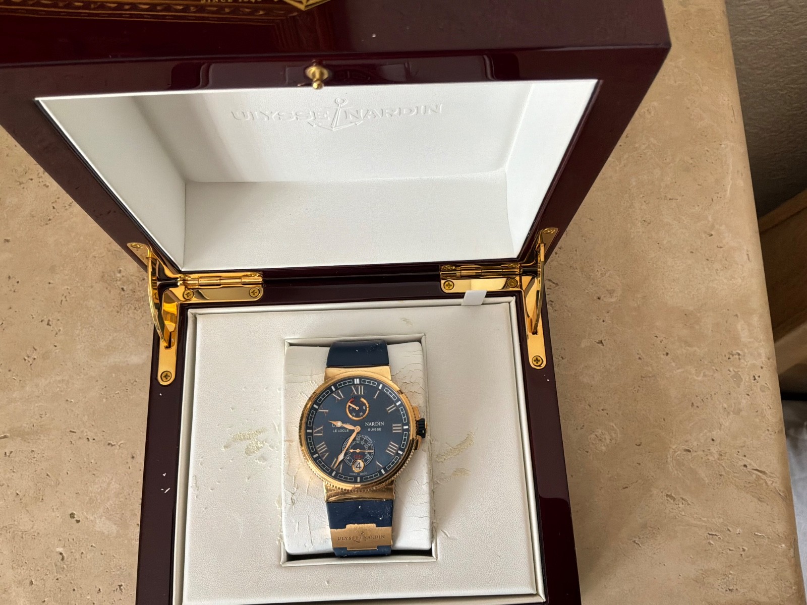 Ulysse Nardin Marine Men’s Gold Watch.