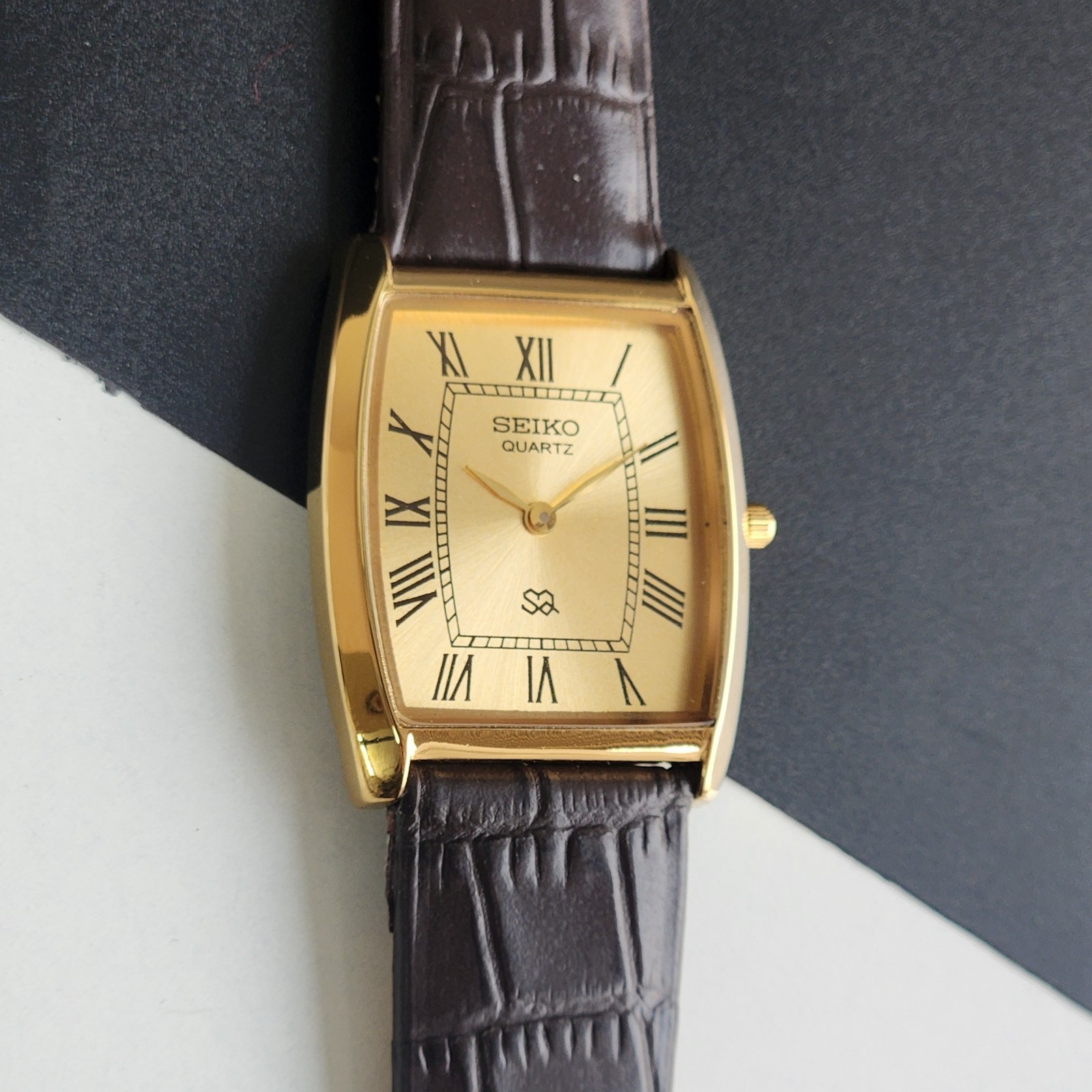 Vintage Seiko Slim Tank Quartz Men Golden Dial Dress Watch-Free Shipping.