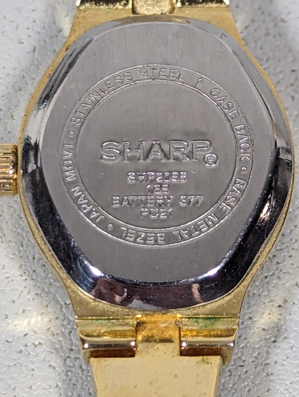 Sharp Womans Silver Dial GoldTone Oval Case Textured Bracelet Band Watch 6.75 in