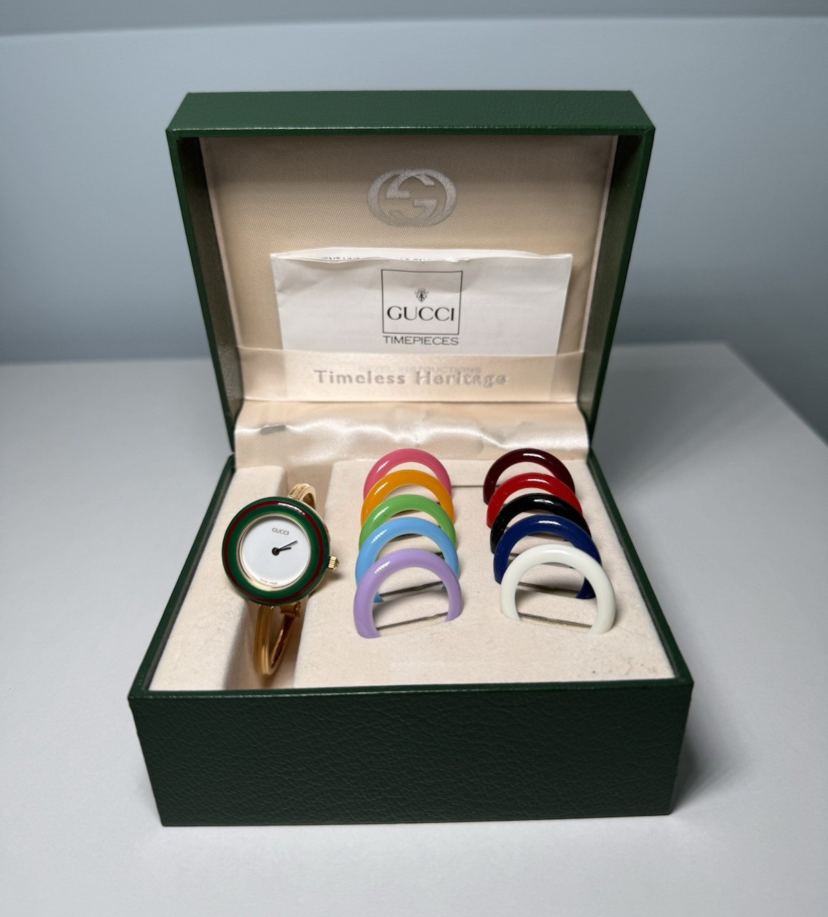 Gucci 11/12.2 Women’s Quartz Gold Tone Bangle Watch w/ Change Bezels Box
