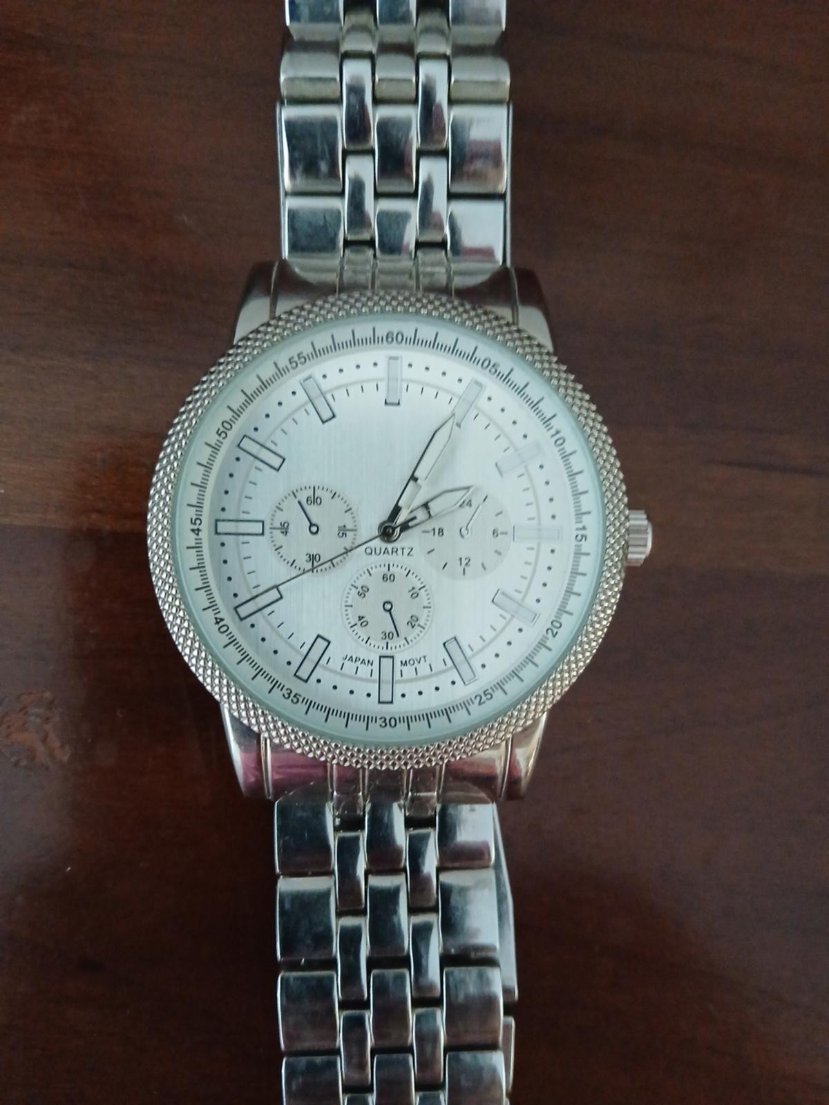 Accutime Watch Corp silver wristwatch