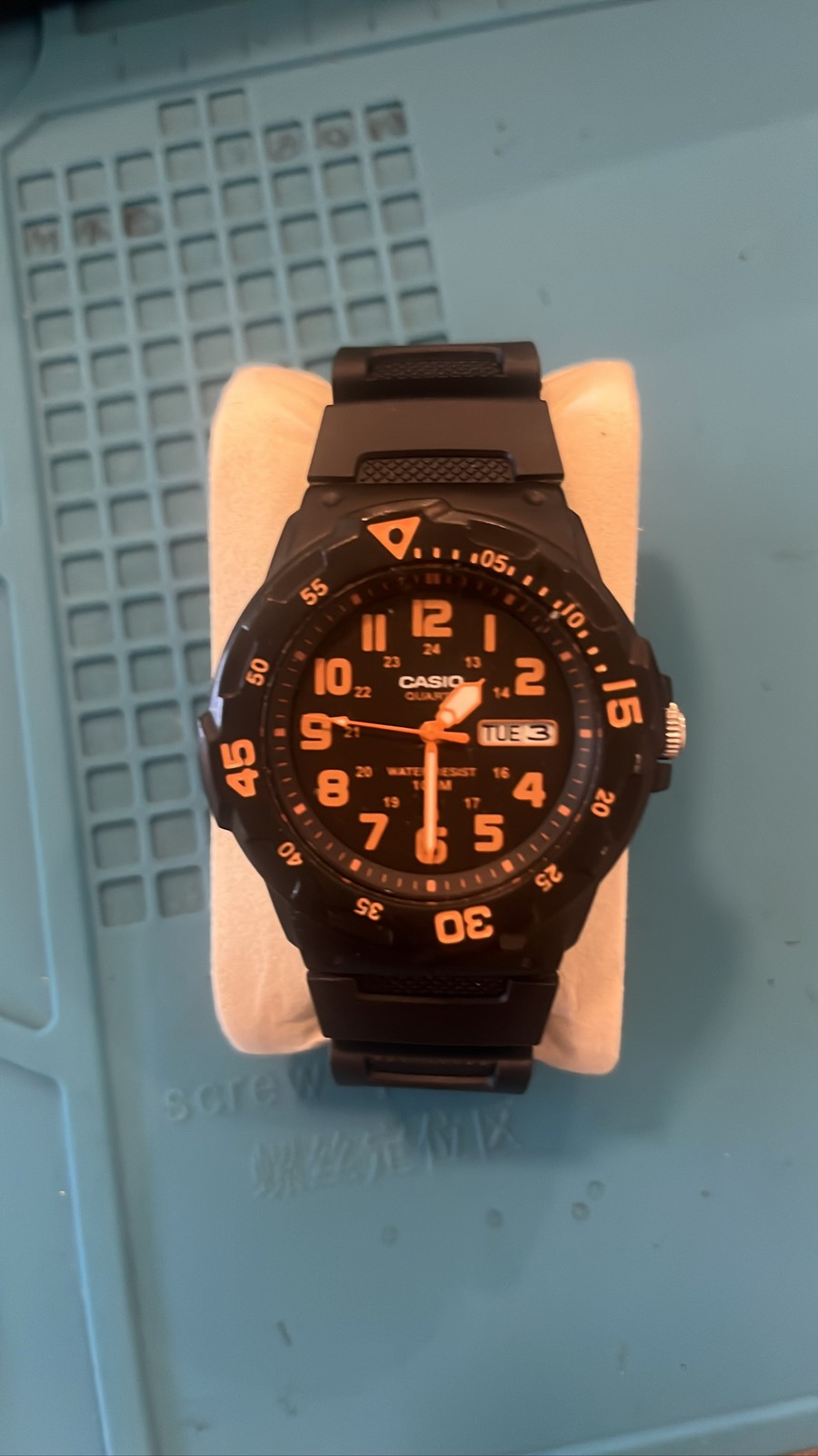 Casio MRW200H-4B Men’s Black Diver Style Analog Watch Orange Accents