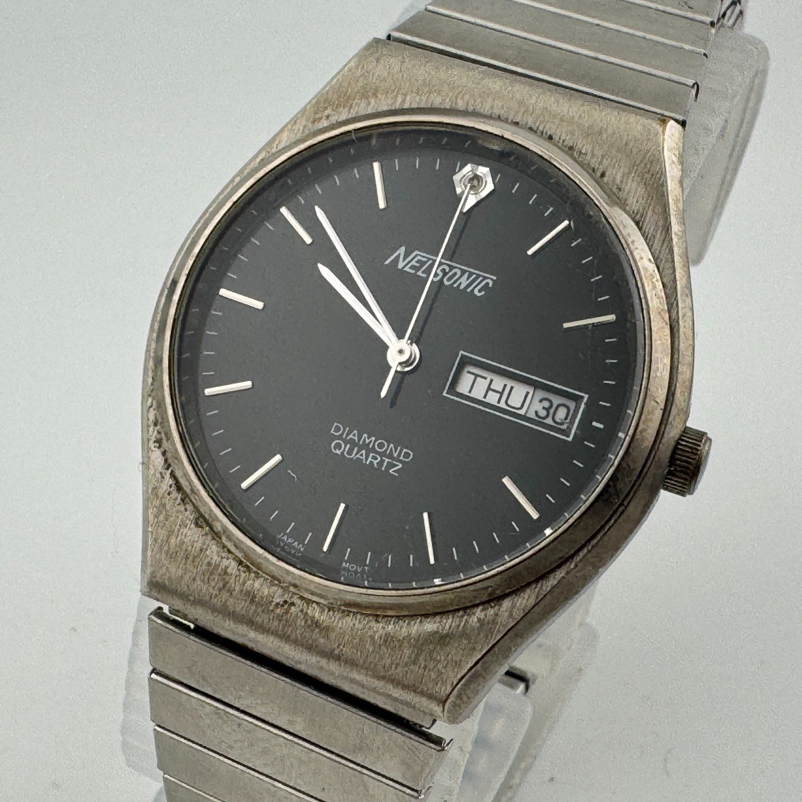 VTG Nelsonic Quartz Watch Men Silver Black Diamond Day Date Stretch New Battery