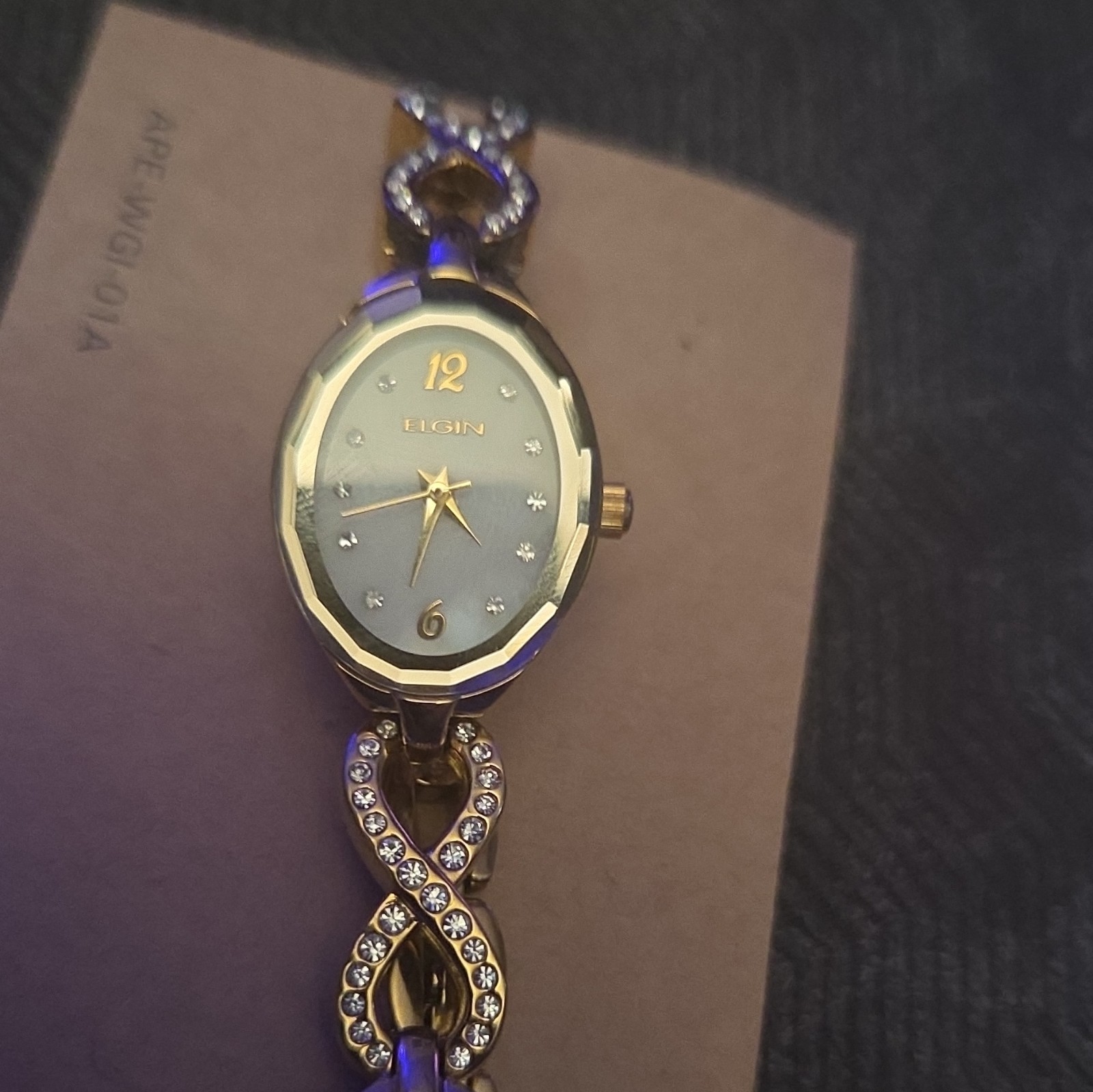 Elgin Women’s Quartz Analog Oval Watch Blue Dial Gold Tone Bracelet