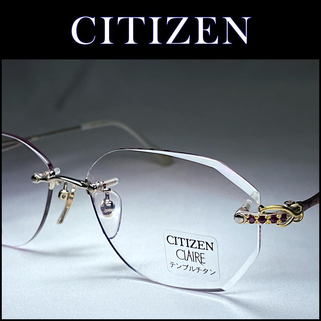 194 CITIZEN ladies’ rimless with natural ruby