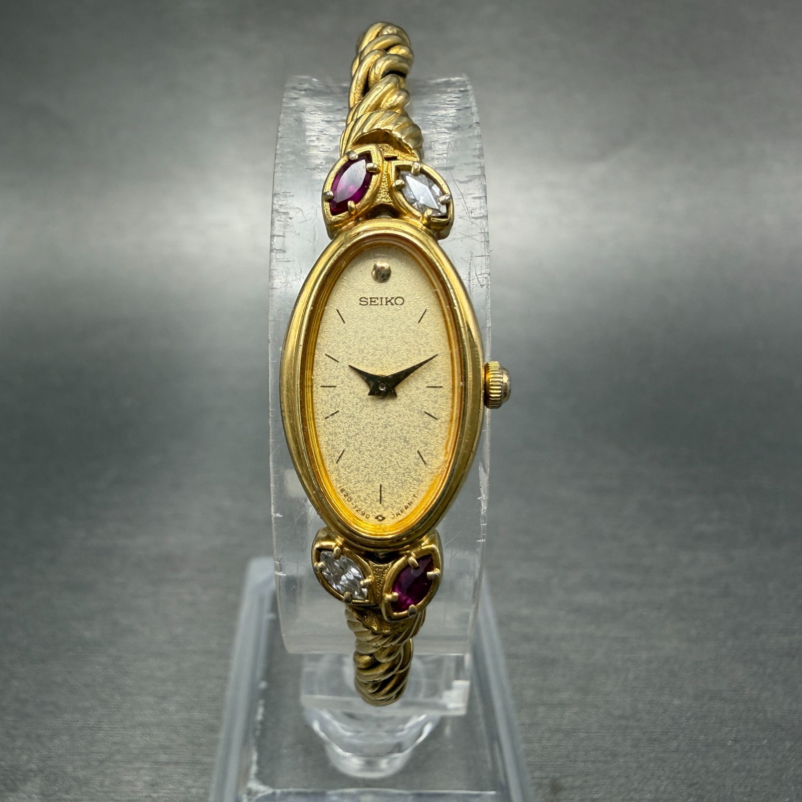 Seiko Watch Women 13mm Champagne Dial Gold Tone Oval 1E20-5760 New Battery Gems