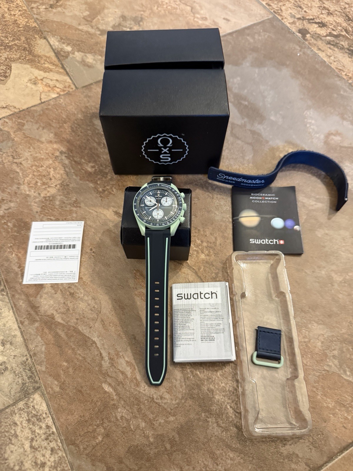 Swatch Omega Mission On earth