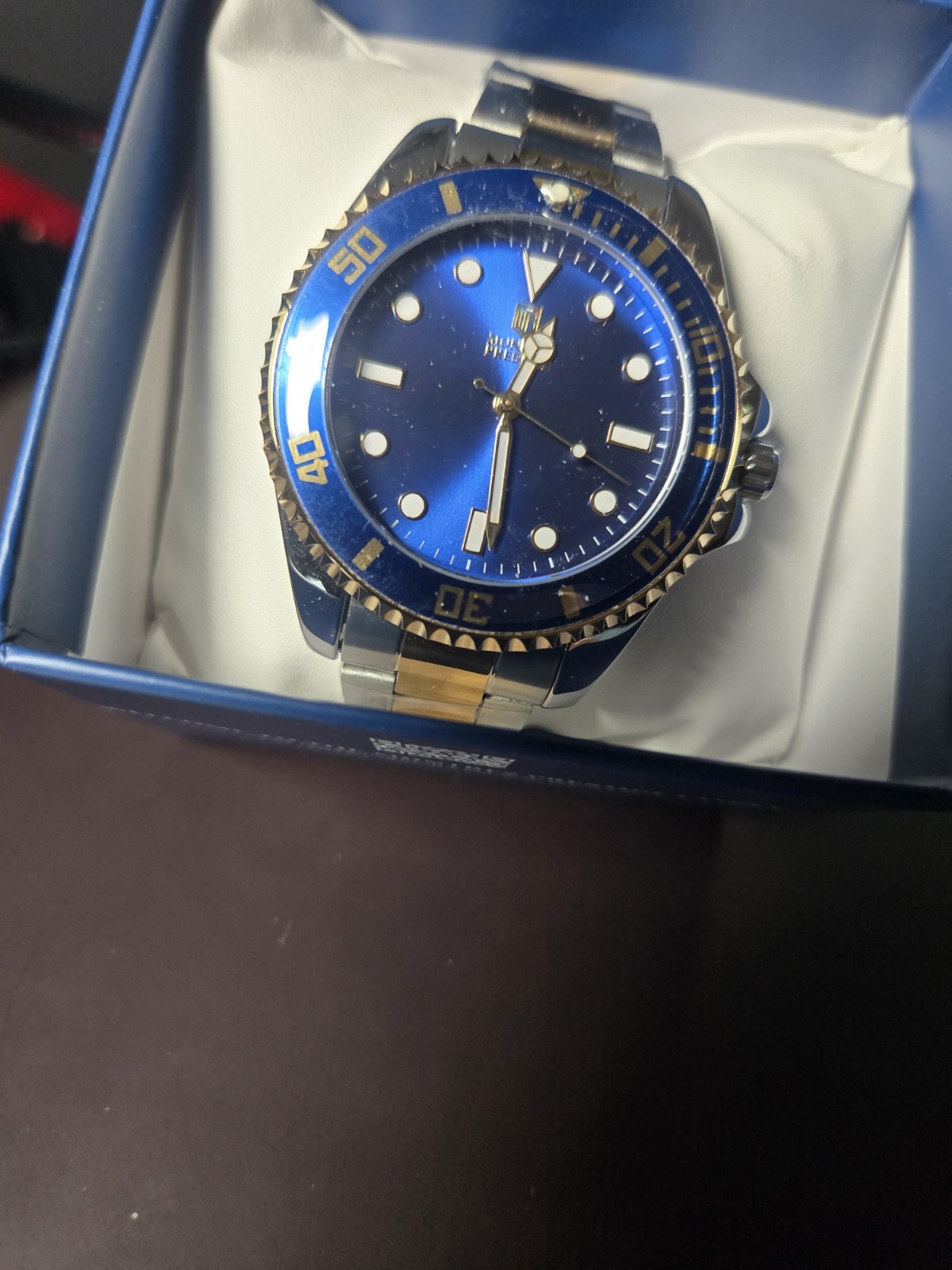 Montres Prestige Men’s Quartz Blue Dial Unidirectional Bezel Two-Tone Bracelet