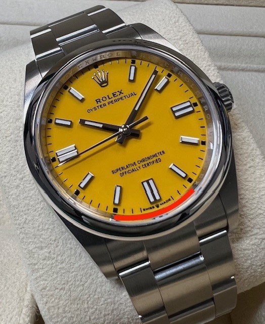 ROLEX OYSTER PERPETUAL 36MM 126000 STAINLESS STEEL YELLOW DIAL W/ BOX/RSC PAPER