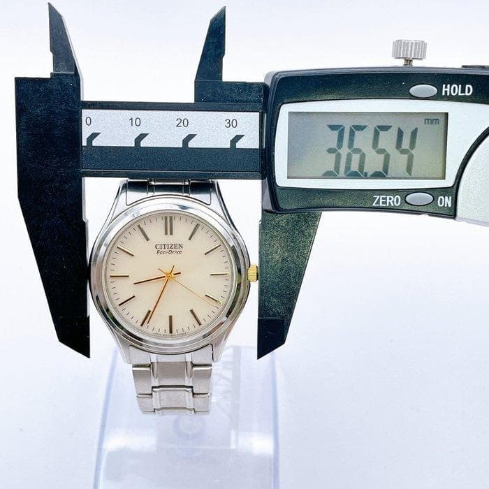 Working condition Citizen wristwatch, ivory dial, Eco-Drive quartz, stainless