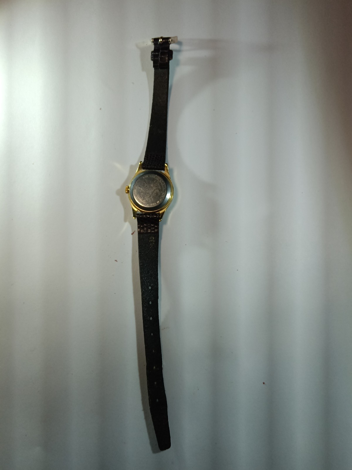 Classic Timex Quartz Analog Watch with a Gold-Tone Round Case
