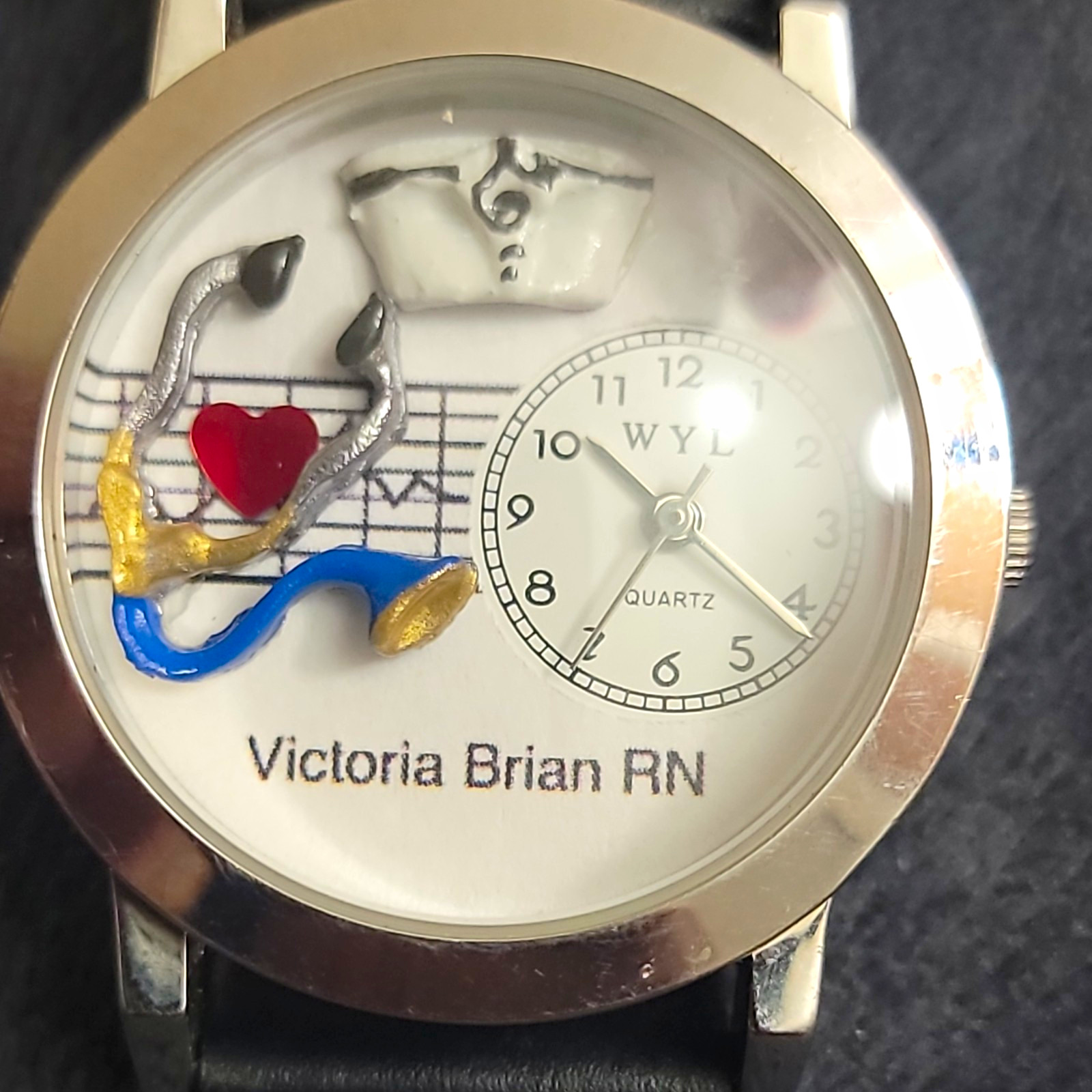 WYL Quartz Analog Nurse Theme Watch White Dial Arabic Numerals Black Leather