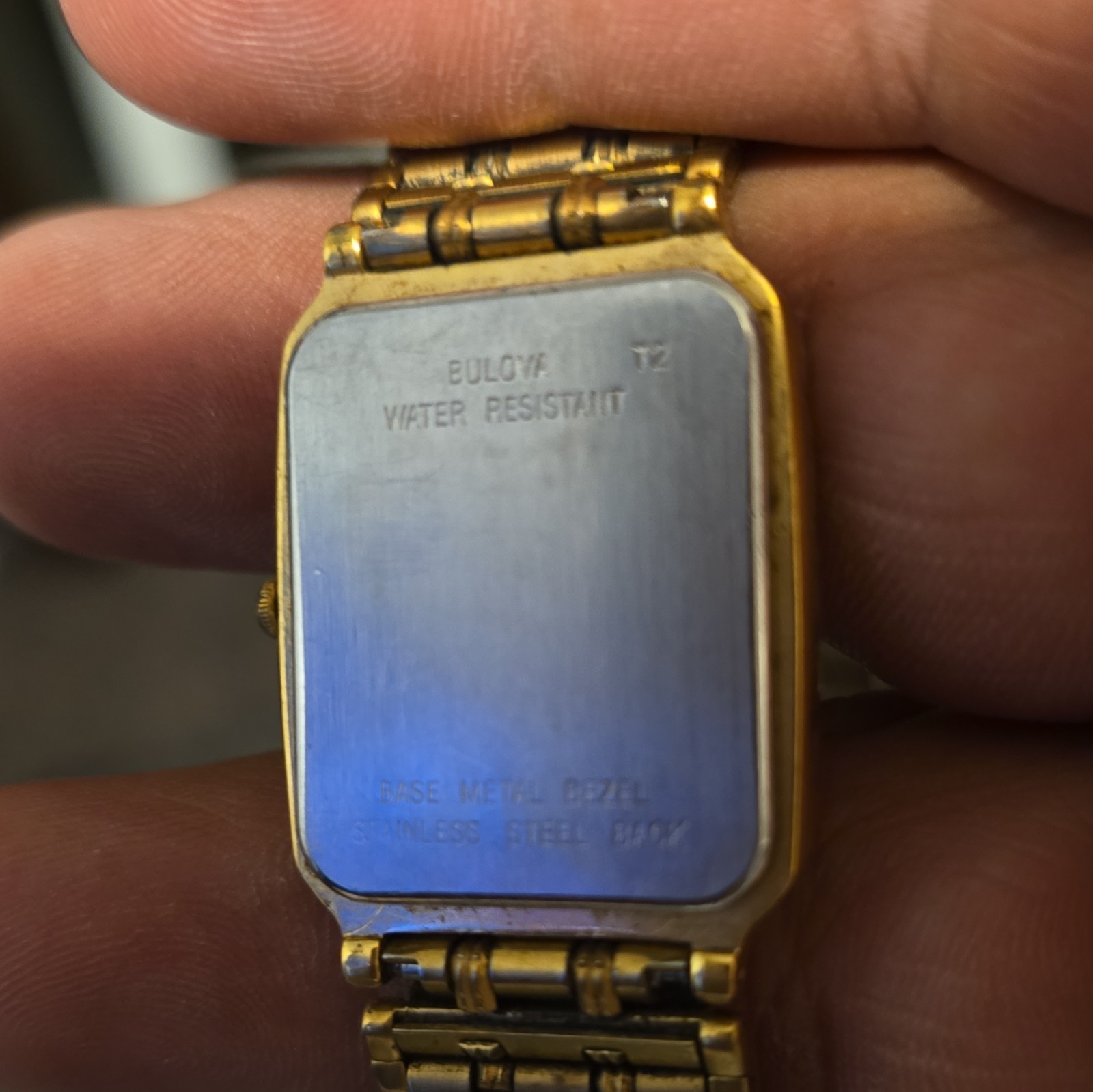 Bulova Quartz Analog Rectangle Gold Dial Stick Indexes Gold Metal Bracelet WR