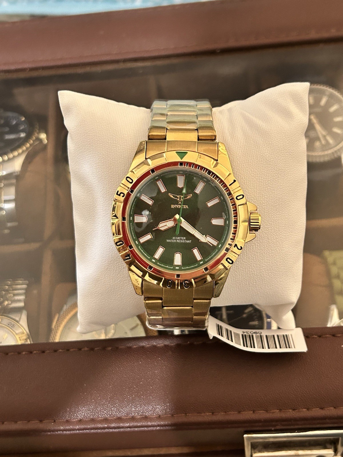 Invicta Specialty men’s watch (model 69034) a 42mm gold tone case green dial