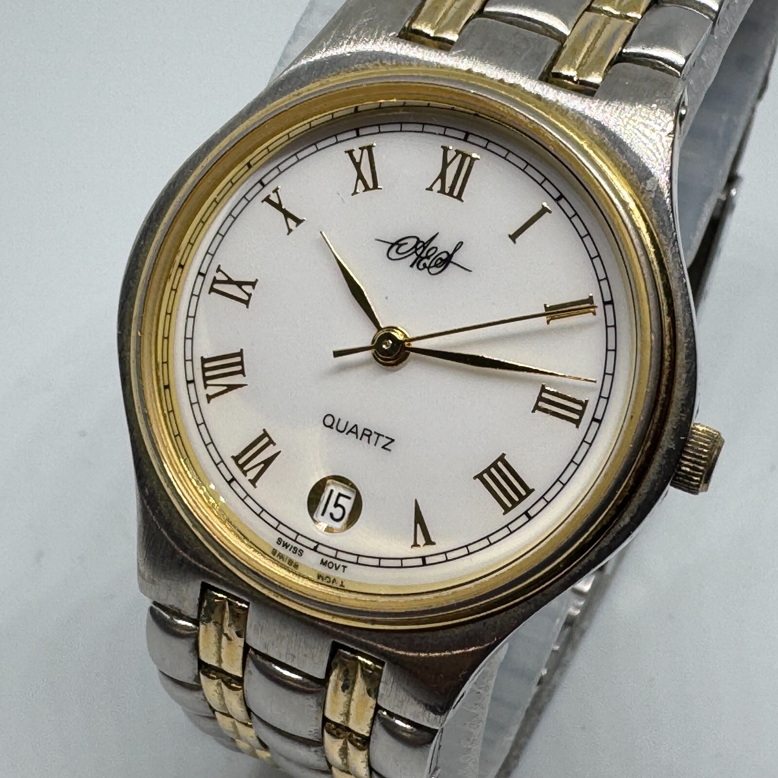 VTG AES Swiss Quartz Watch Men Dual Tone Roman Dial Date Analog New Battery 6.5″