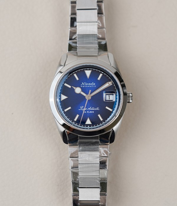 Nivada Grenchen Antarctic Blue Date 38mm 32076A20 Flat Link Men’s Watch