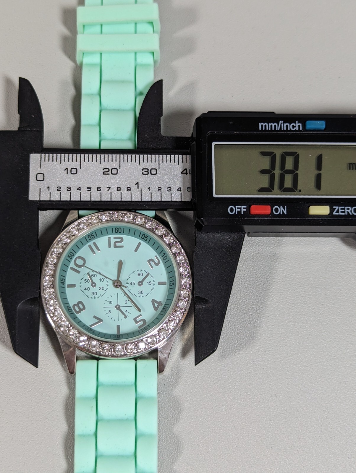 Green Dial Crystal Accent Round Silver Tone Case Green Silicone Band Watch