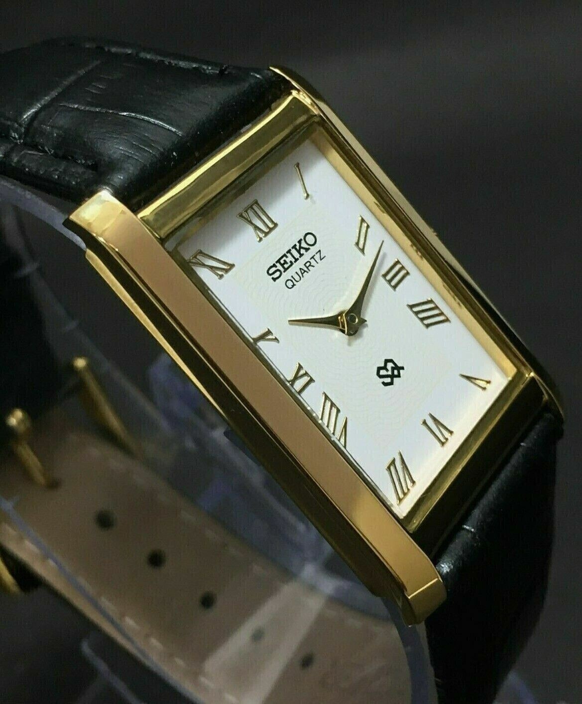 Vintage Seiko Slim Quartz Rectangle White Face Japanese 26MM Case Mens Watch A27