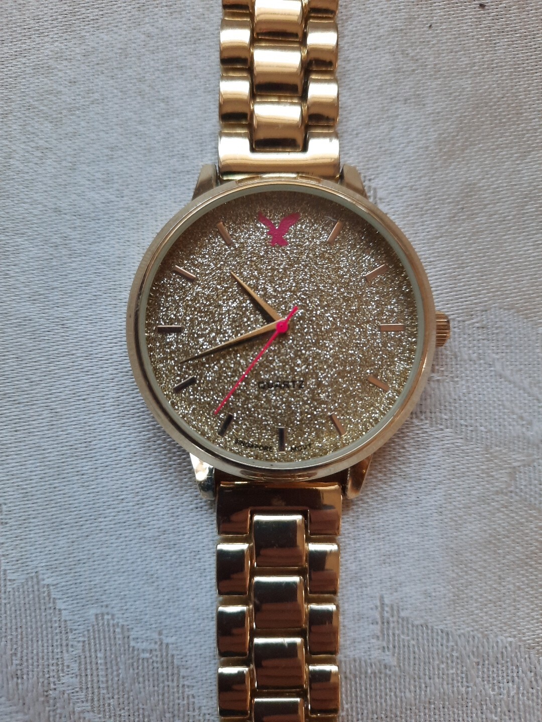 American Eagle 13429 Glitter Dial, Ladies Goldtone Metal Band Watch New Battery
