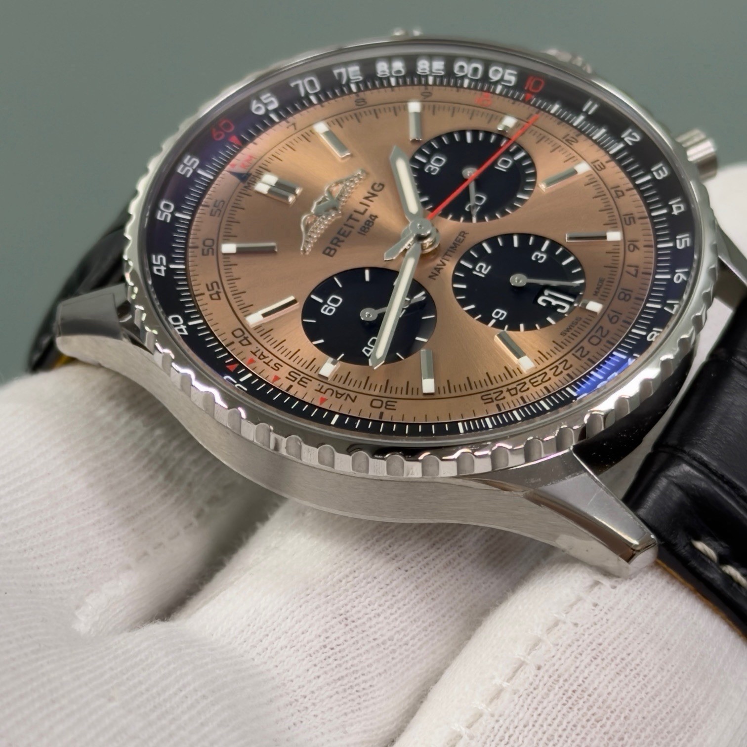 Breitling Navitimer B01 AB0138 43mm Copper Dial Stainless Steel Box Papers