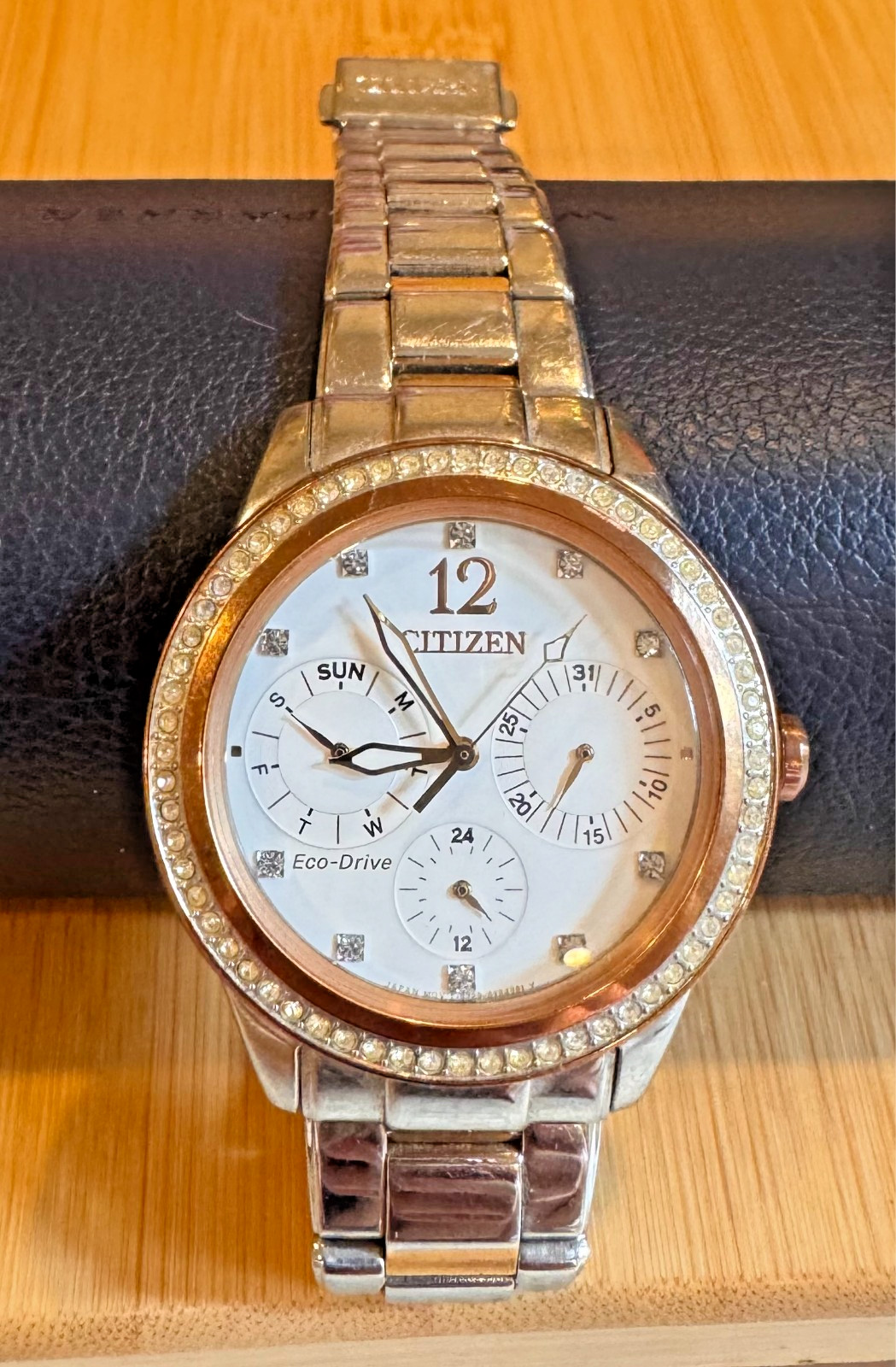 Citizen Eco-Drive, Silver, Rose Gold trim and Crystal, Band-Silver Women’s