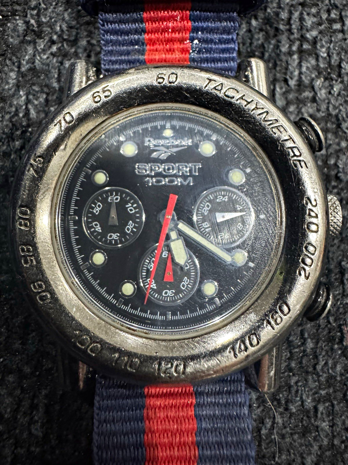 Reebok Sport Chronograph Quartz 100m Tachymeter Blue Dial Blue/Red Nylon Strap