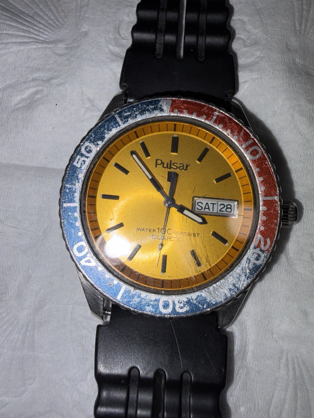 Pulsar Quartz 100m Day/Date Gold Dial Diver Watch Blue/Red Bezel Black Strap