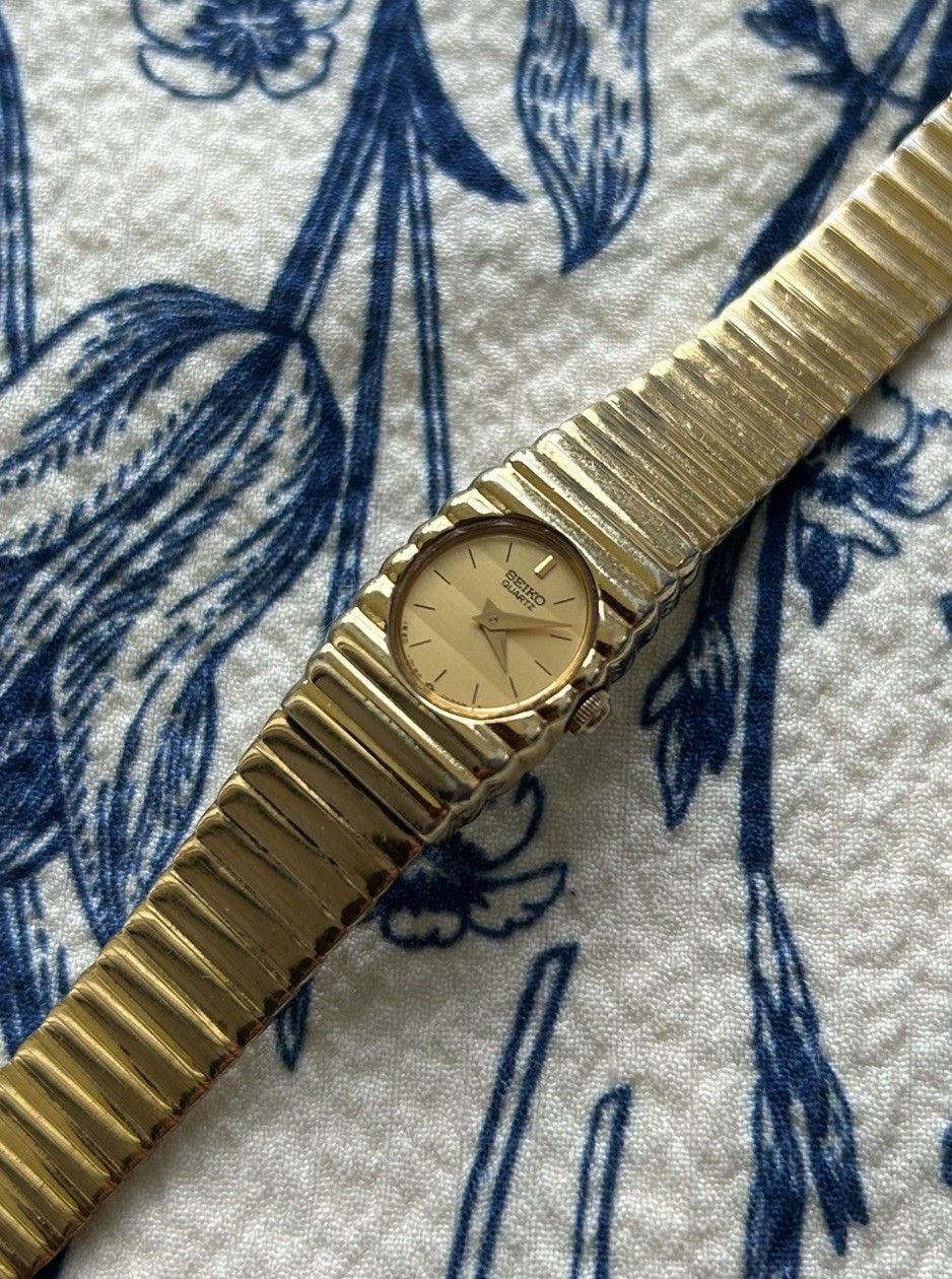 Seiko Watch Women 14mm Champagne Dial Gold Tone Rectangle 1E20-5099 New Battery