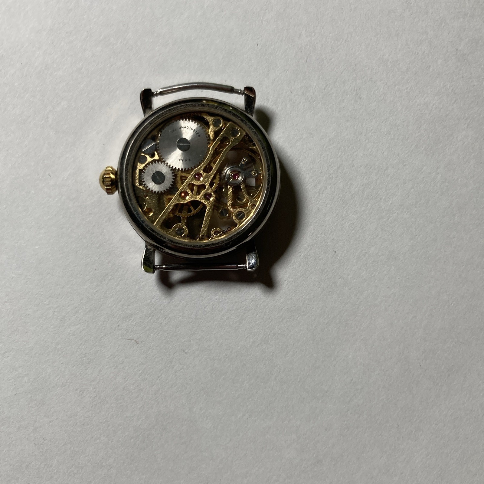 Fossil Mechanical Skeleton Dial Roman Numerals Gold and Silver Watch