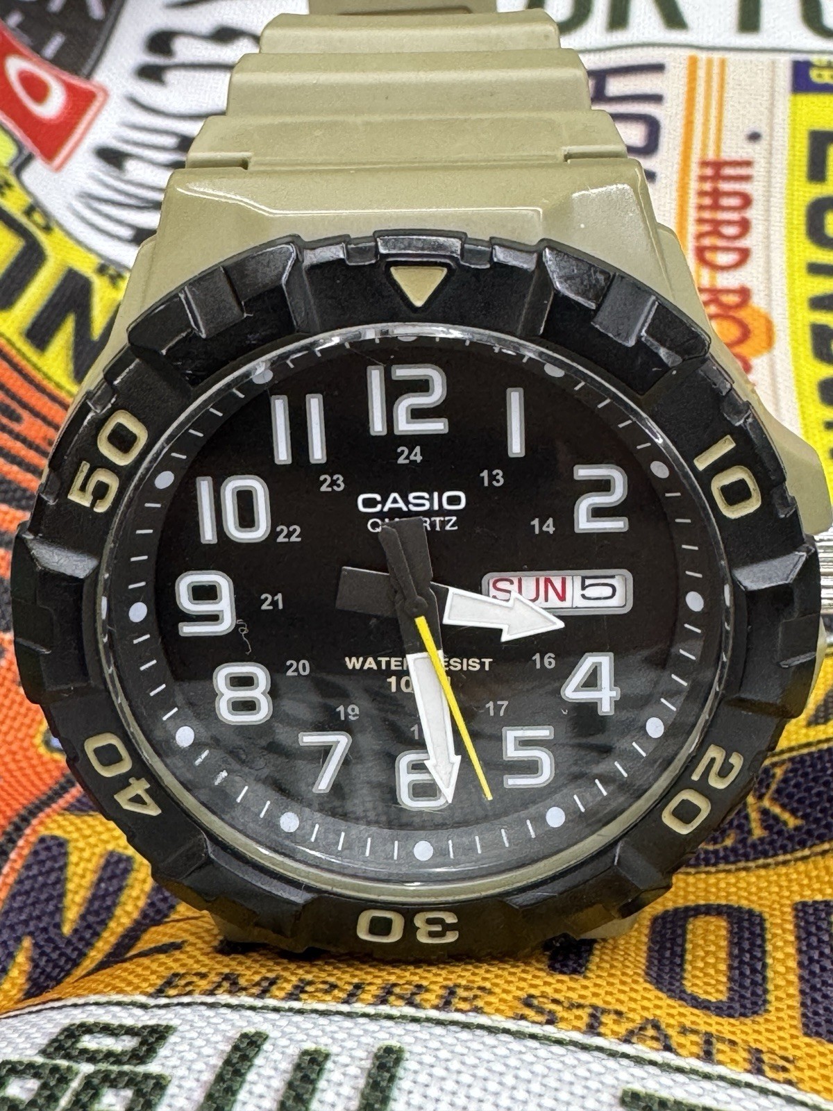 Casio MRW-210H Quartz Analog Day/Date 100m Black Dial Beige Resin Strap