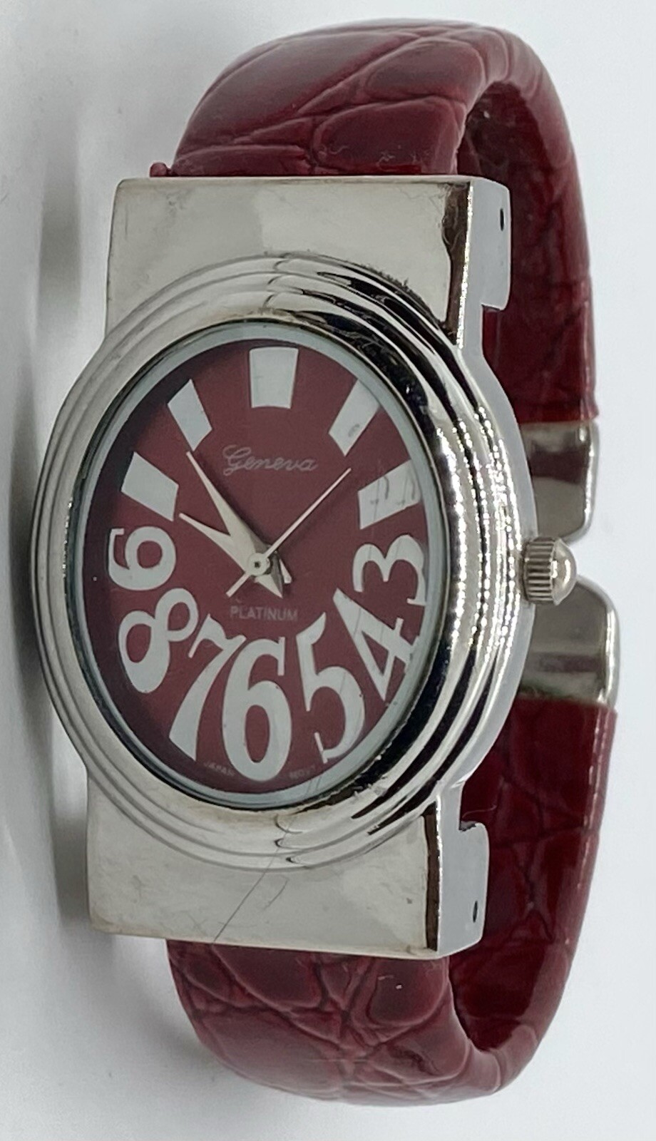 GENEVA PLATINUM Watch New Battery Dark Red Oval Dial Emboss Strap Large Numbers