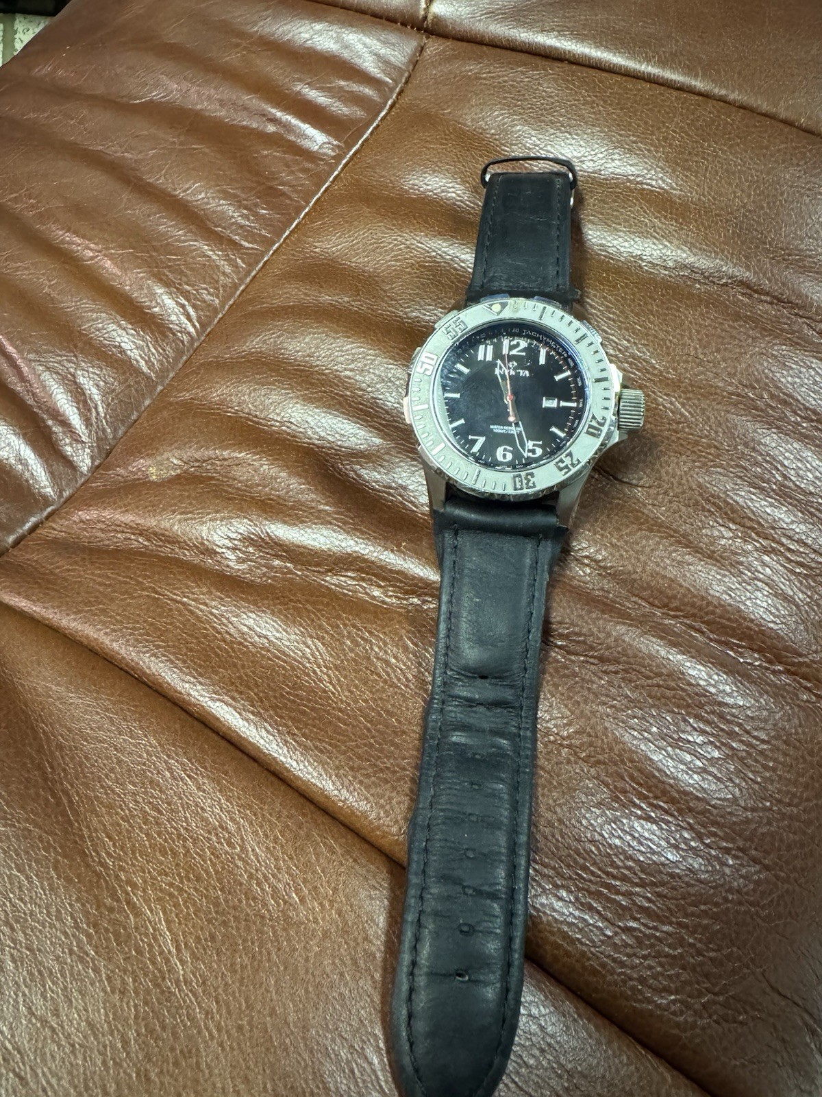Invicta 4659 Men’s Quartz Analog Watch Black Dial, Leather Strap, 100m