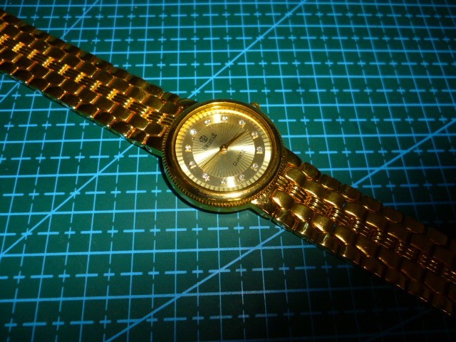 UNISEX SWISS MADE 18K GOLD PLATED SWISTAR DRESS WRISTWATCH NEW WITHOUT TAGS.